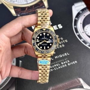 Replica Rolex GMT-Master II 126718GRNR-0001 Oro Giallo Quadrante Nero Jubilee 1:1 Clean Factory 40mm Orologio