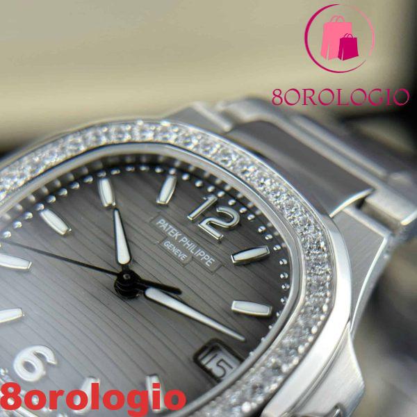 Patek Philippe Nautilus 7010/1G-012 Quadrante Grigio Fumo Ghiera con Diamanti Swiss Quartz Migliore Replica 32mm Orologio - immagine 6